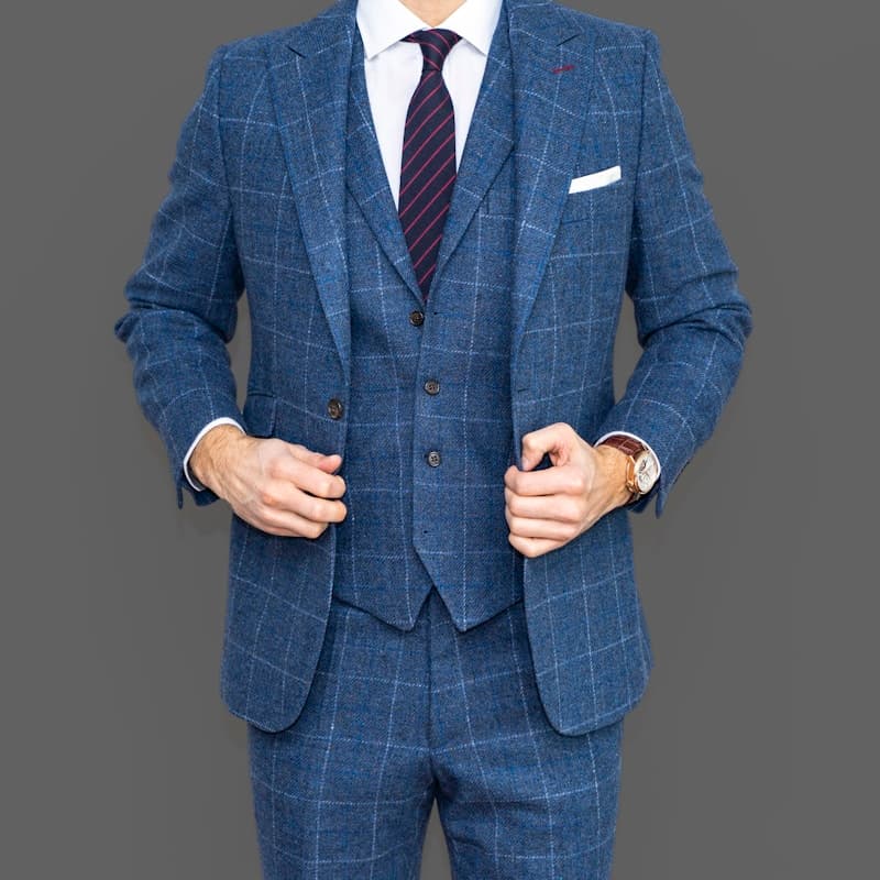 Close up fine herringbone bespoke suit jacket